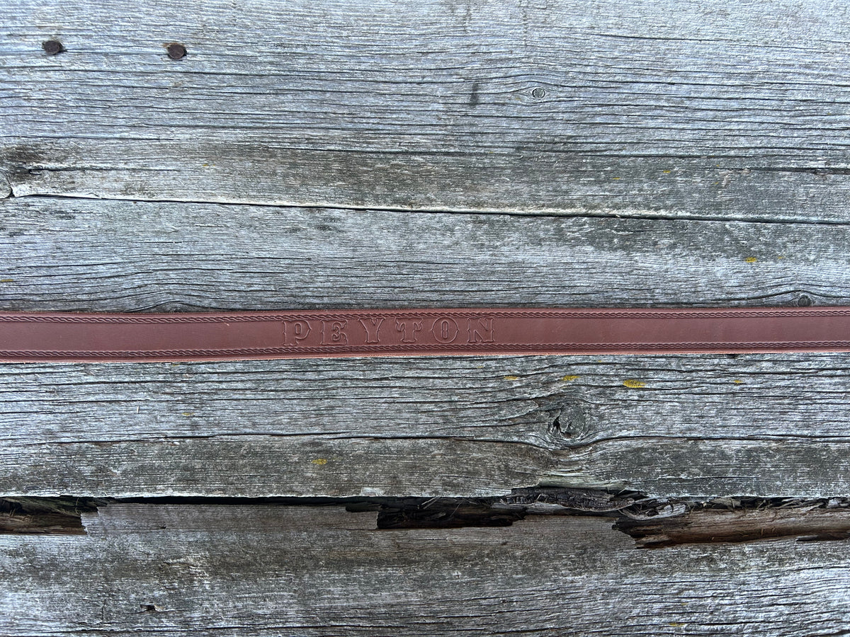 Name Stamped onto bedroll belt